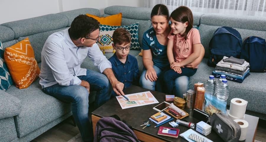 Father showing loved ones where to meet during a crisis